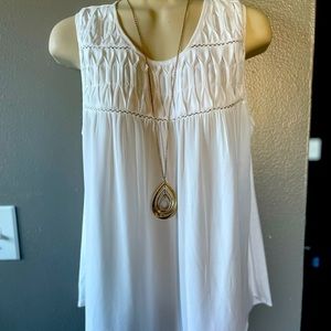 White sleeveless top
